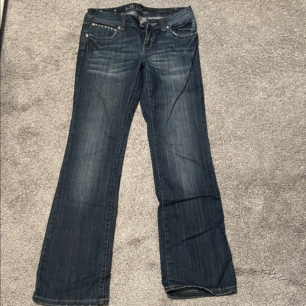 Women's blue flared jeans with bedazzled and embroidered design